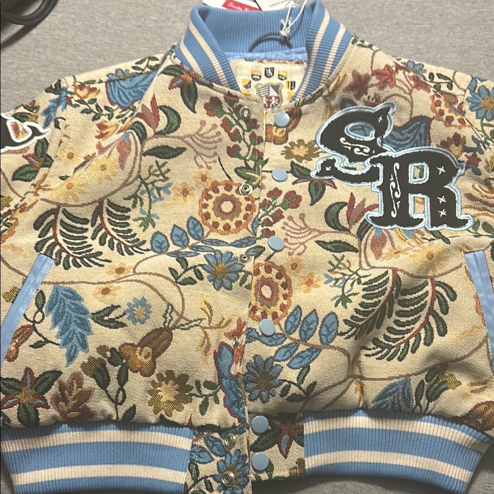 Floral Woman Jacket with Blue Accents